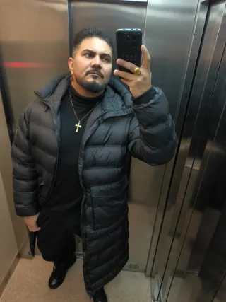 Chaqueta larga acolchada negra corte ingles