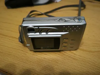 Cámara Digital 3MP 4x Zoom Digital con tarjeta 1Gb