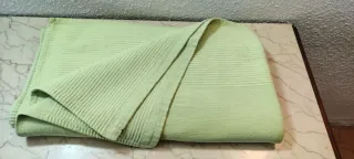 Colcha verde de tela