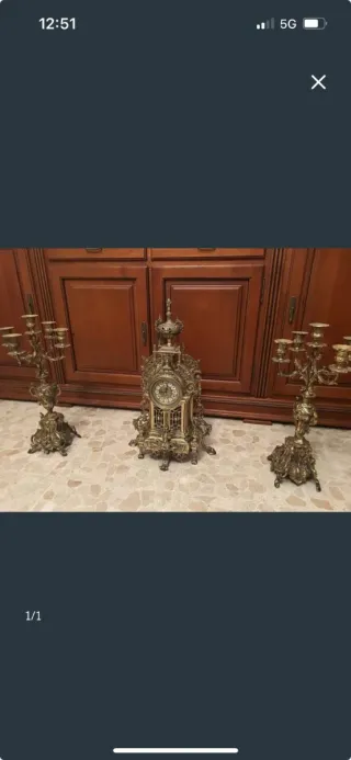 Reloj y candelabros antiguos de bronce