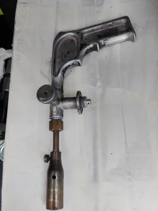 Soplete antiguo de latón y metal