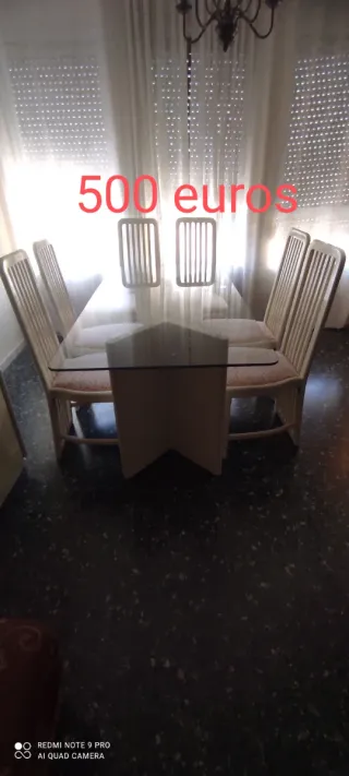 Mesa de comedor de cristal con 6 sillas