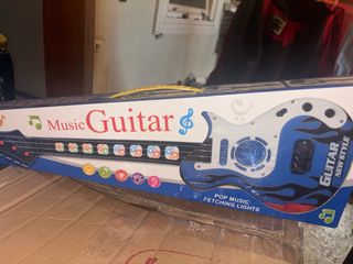 Guitarra musical infantil con luces
