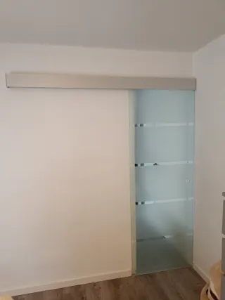 Puerta corredera de cristal