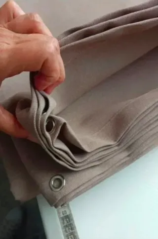 Lona de toldo con anillas