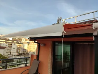 Toldo para el sol color salmón