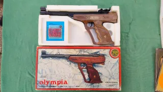 Pistola giocattolo vintage Olympia a gommini