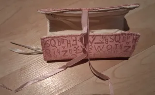 Organizador de joyas de viaje de tejido rosa