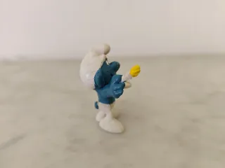 Pitufo artista con paleta y pincel