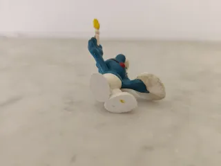 Pitufo artista con paleta y pincel