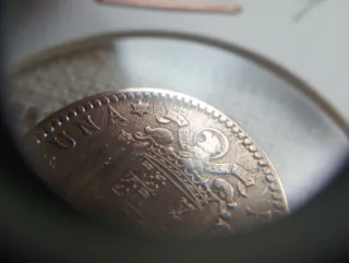 Error peseta repinte o incusa.