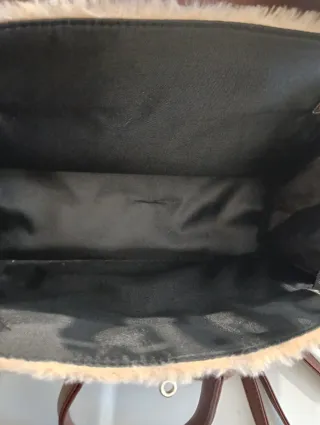 Bolso peluche con cara sonriente