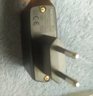 Carregadors Nokia AC3E, AC8E i Philips HQ8505