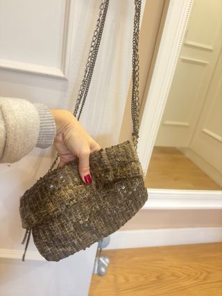 Bolso piel y pedrería oro viejo/bronce