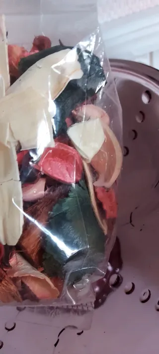 Florero de cristal , en forma de flor.