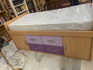 Cama individual con cajones y puertas