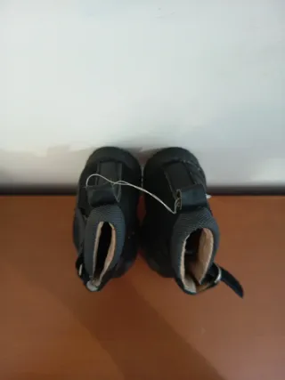 Botas de pele para criança