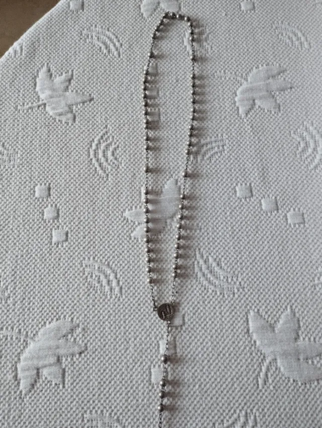 Rosario de plata antiguo