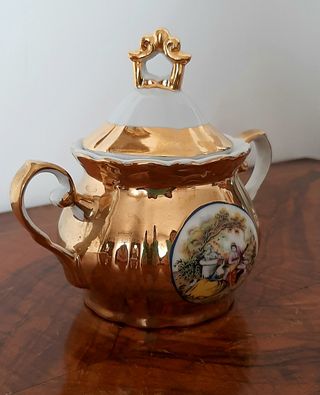 Zuccheriera in porcellana dorata