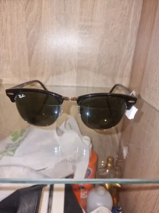 Gafas de sol Ray-Ban Clubmaster negras y doradas