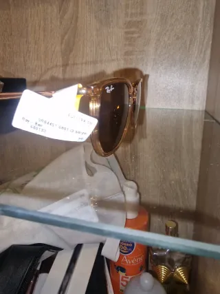 Gafas de sol Ray-Ban Clubmaster negras y doradas