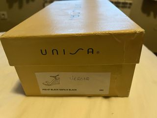 Sandalias Unisa tacón cuña negras y beige