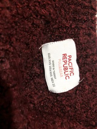 Camisola malha crop decote redondo