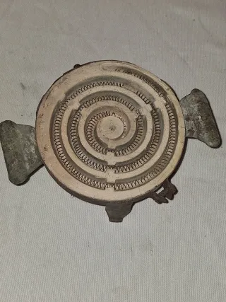 Antiguo hornillo decorativo espiral