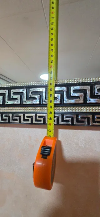 Espejo decorativo negro y plateado