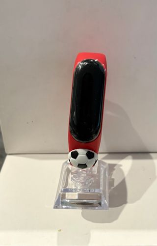 Reloj deportivo con balón de fútbol