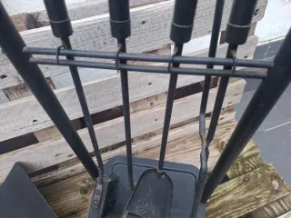 Leñero metal y útiles chimenea