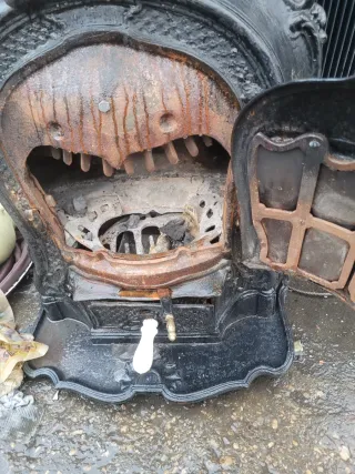 Estufa chimenea salamandra antigua