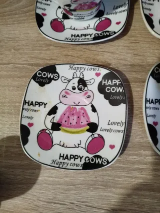 Juego de 4 tazas de café con platillos