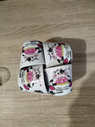 Juego de 4 tazas de café con platillos