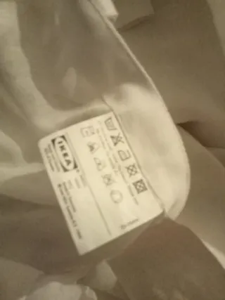 Cortinas blancas de lino,con un pequeño defecto..