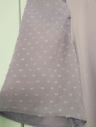 Blusa morada con mangas abullonadas