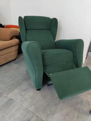 Sillón orejero verde tela