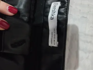 Pantaloni a zampa neri in ecopelle