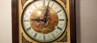 Reloj de péndulo madera y metal marca radiant