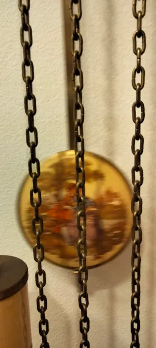 Reloj de péndulo madera y metal marca radiant