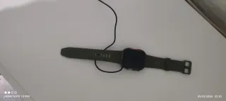 Reloj inteligente sin usar + cargador