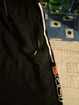 Pantalón chándal negro con rayas