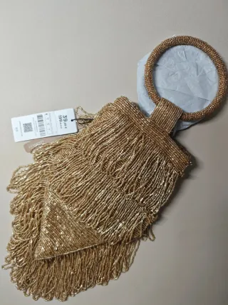 Bolso de fiesta Parfois con abalorios dorado