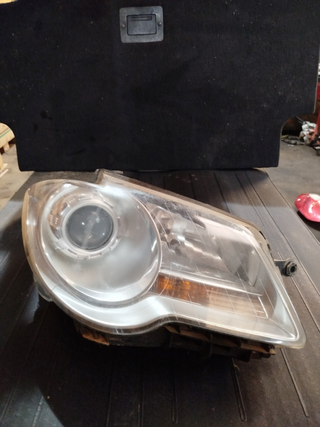 FARO DERECHO VOLKSWAGEN TOURAN (1T2) * | 0.06 -