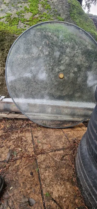 Mesa redonda de cristal de exterior