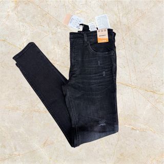 Pantalón tejano desgastado