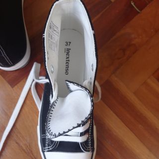 Tenis negros in extenso