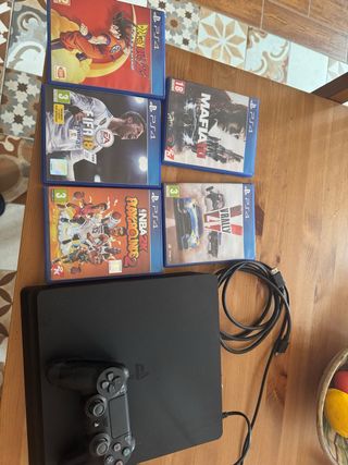 PS4 (Playstation 4) + 4 Juegos