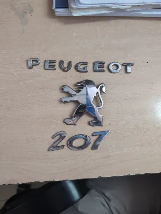 Anagramas Portón Peugeot 207