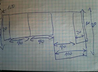 Sofá negro con chaiselongue y asientos extraíbles